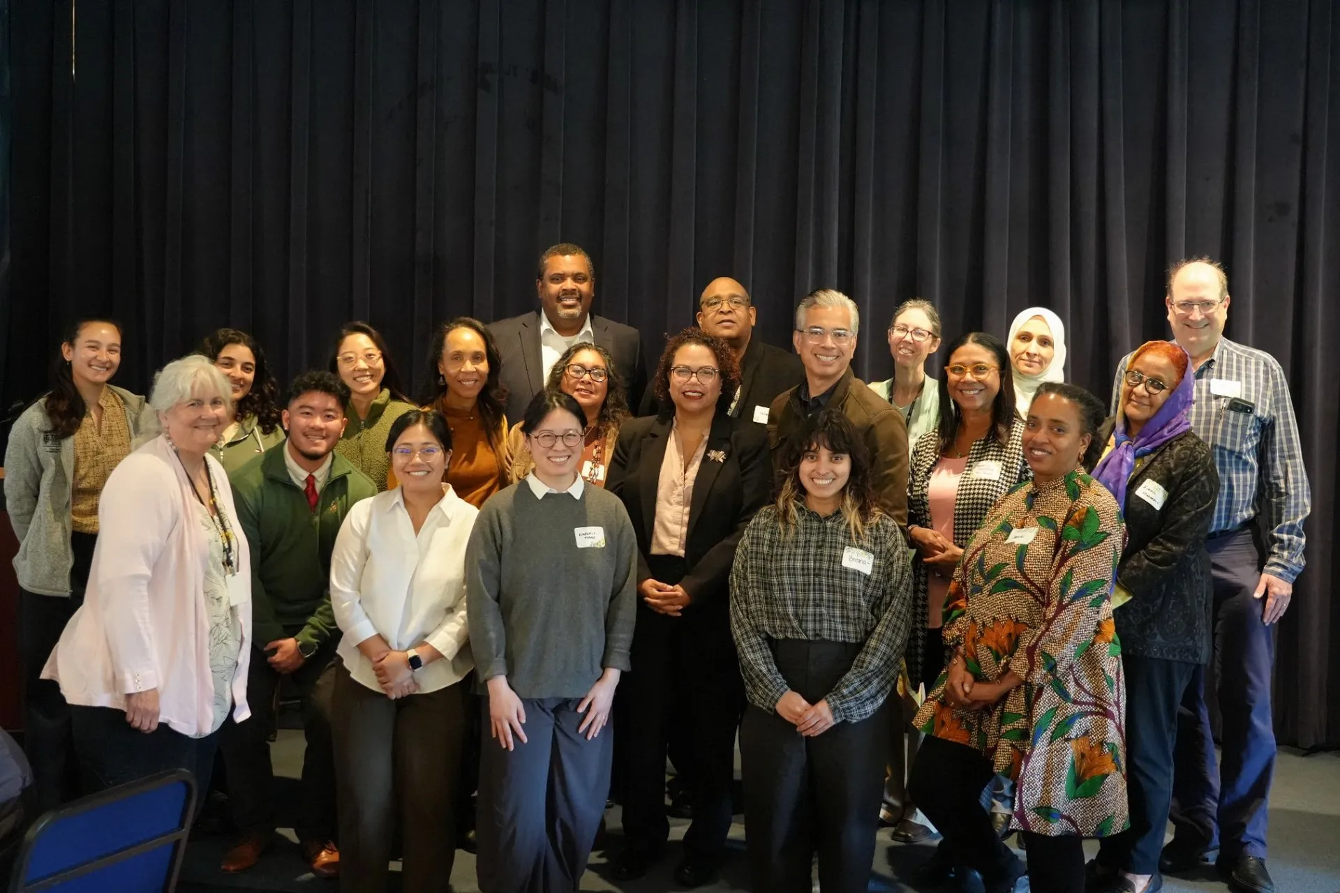 Public health students, faculty, and community participants gathered together at a symposium
